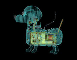 Illustration for article titled CT Scanner Bares Apple Notebook, PS3, and Big Mac to Their Core